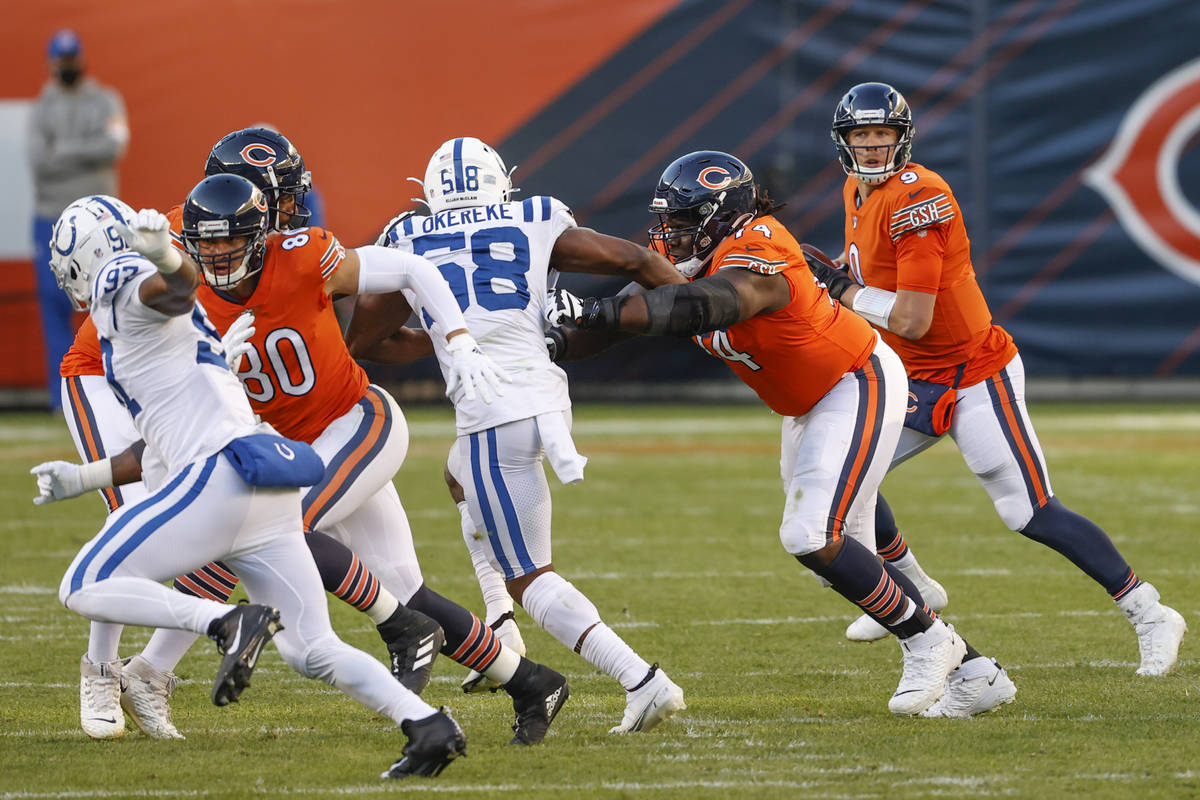 Chicago Bears quarterback Nick Foles (9) looks to pass the ball against the Indianapolis Colts ...