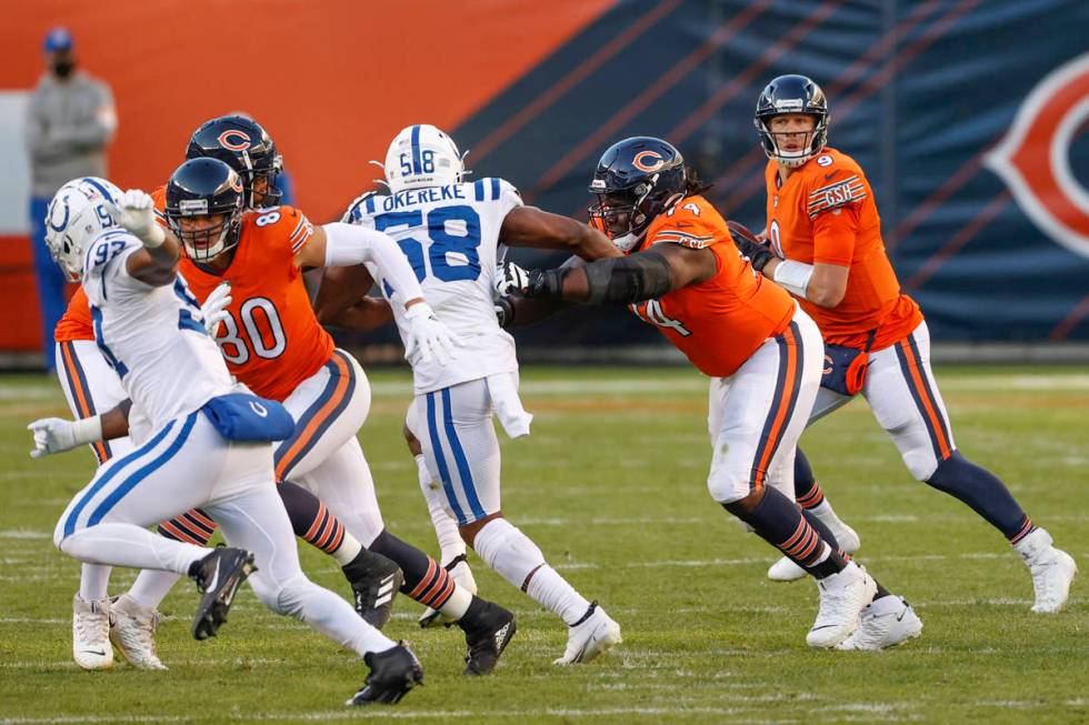 Chicago Bears quarterback Nick Foles (9) looks to pass the ball against the Indianapolis Colts ...