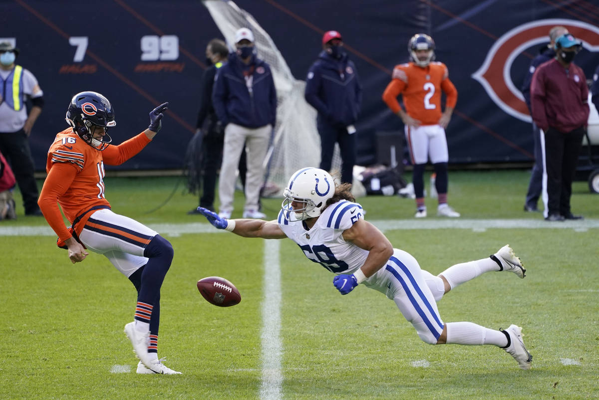 Indianapolis Colts linebacker Jordan Glasgow (59) tips the punt of Chicago Bears punter Pat O'D ...