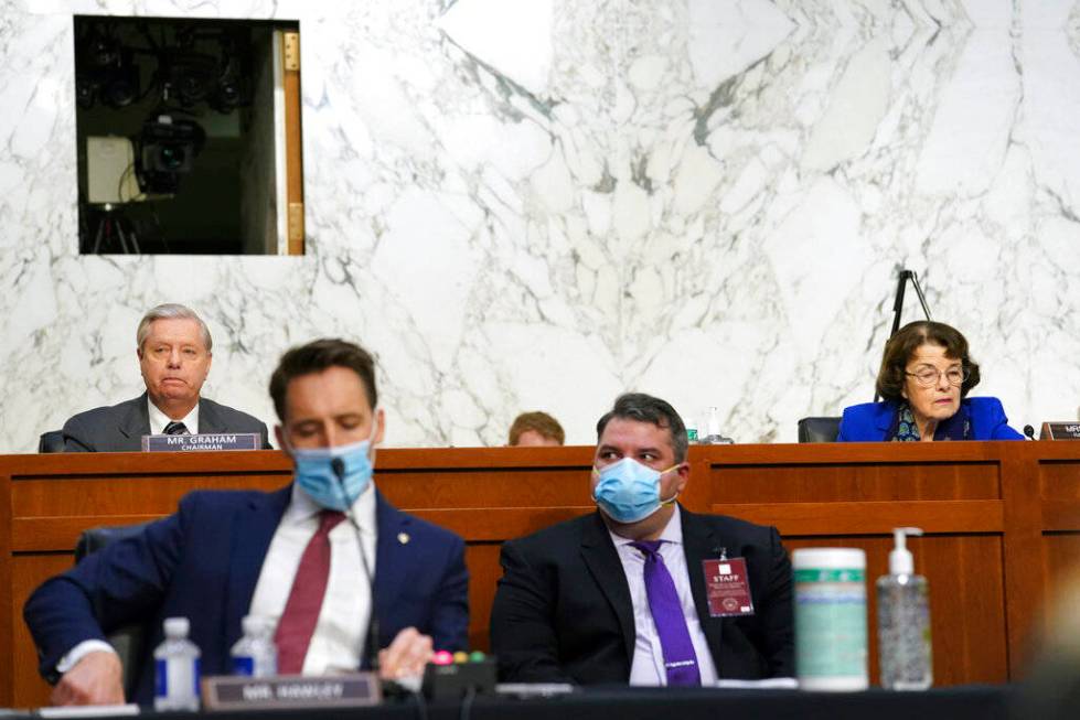 Sen. Lindsey Graham, R-S.C., left, and Sen. Dianne Feinstein, D-Calif., listen during a confirm ...