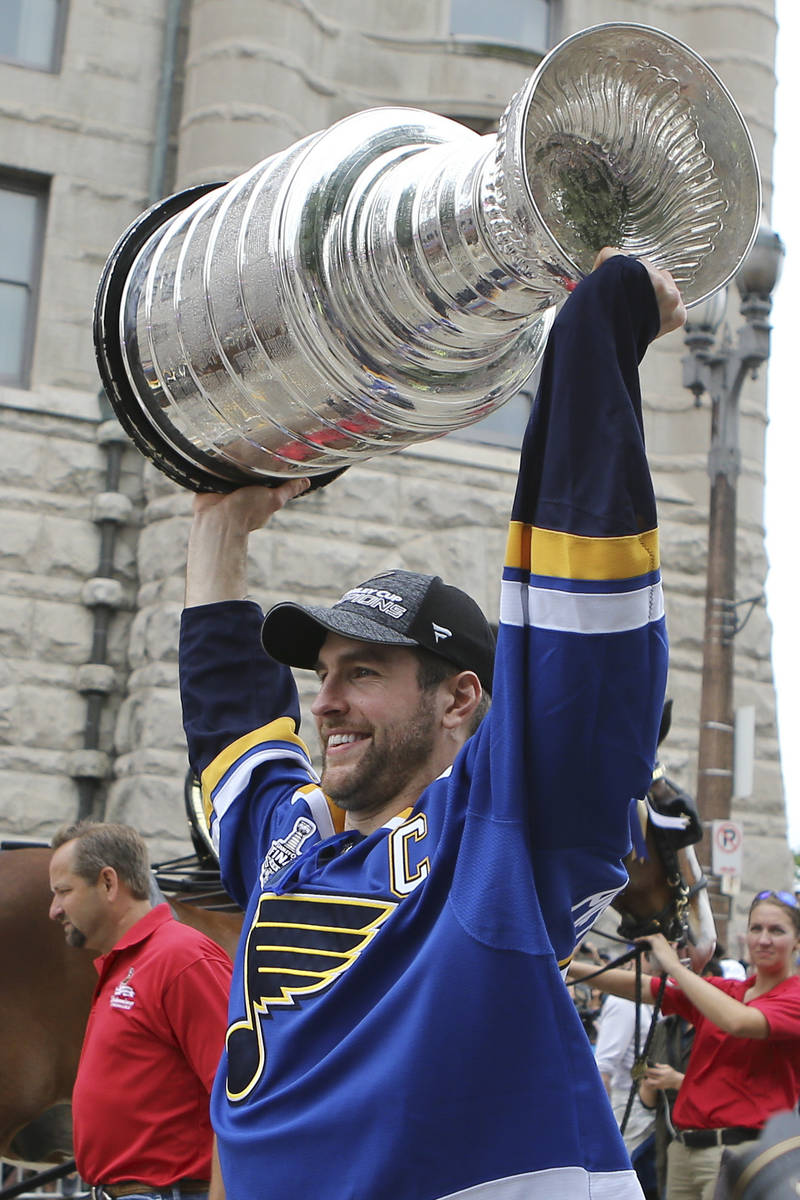 St. Louis Blues' Alex Pietrangelo carries the Stanley Cup during the NHL hockey Stanley Cup vic ...
