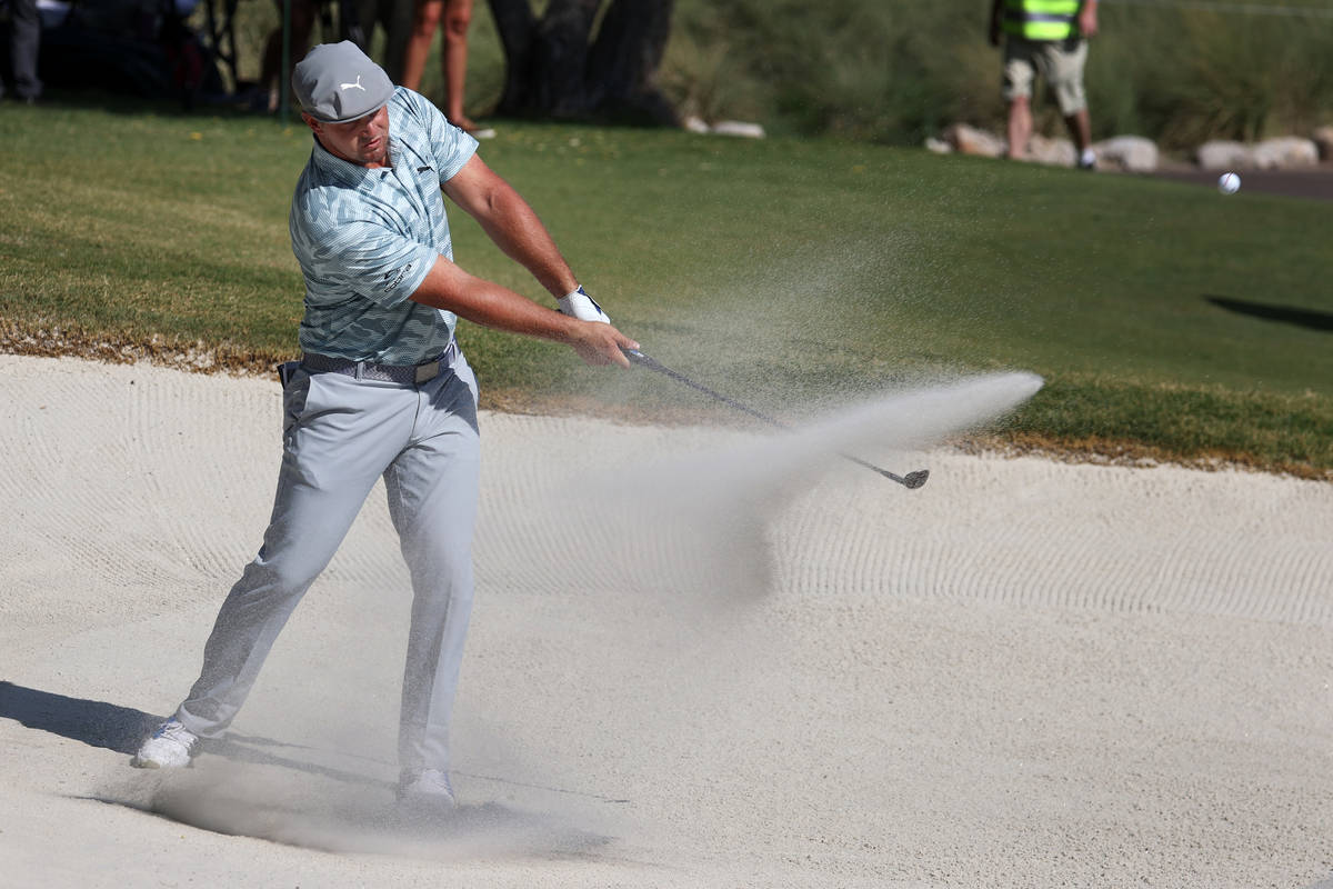 Bryson DeChambeau hits the ball from the bunker at the seventh hole during round three of the 2 ...