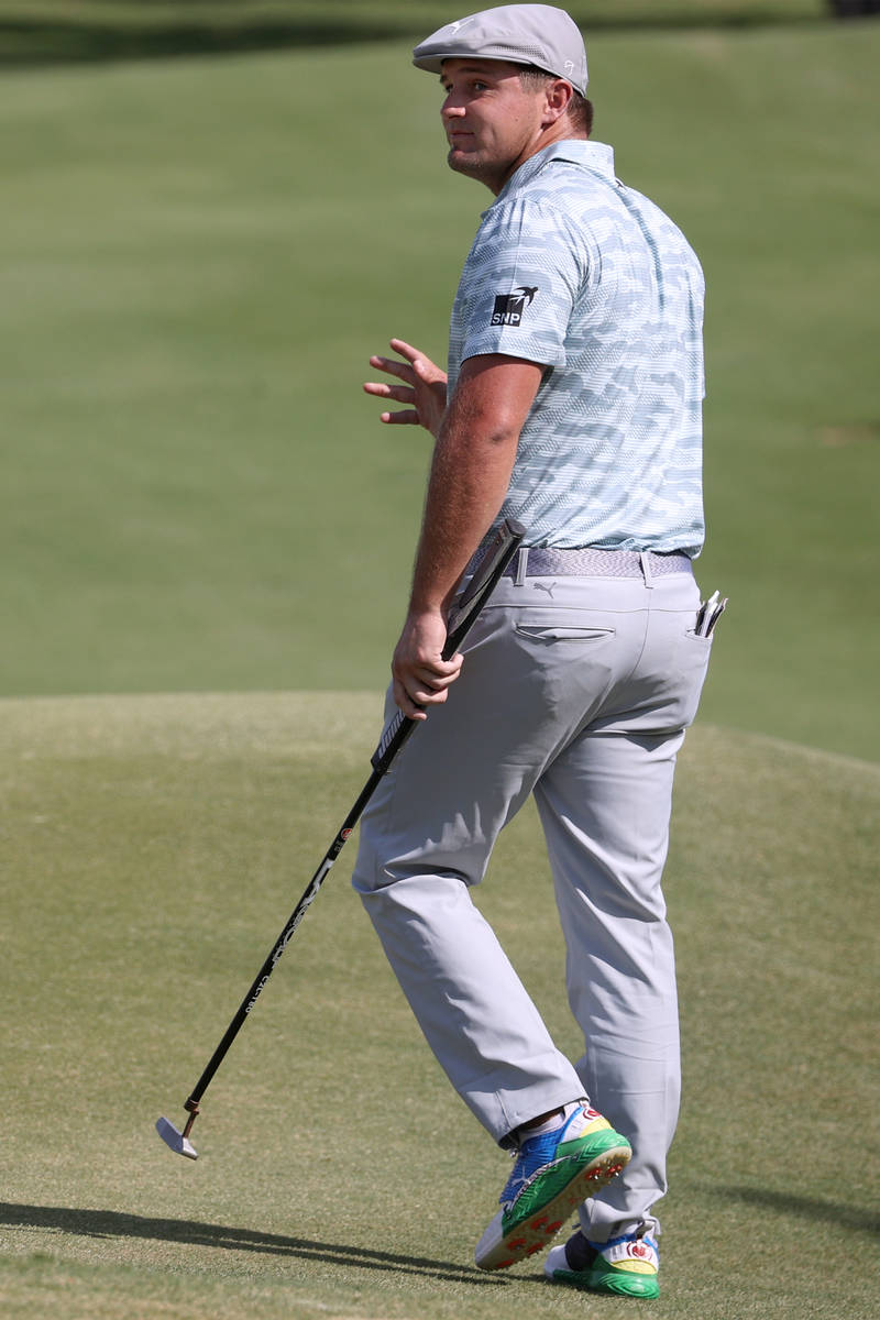 Bryson DeChambeau reacts after hitting an eagle at the third hole during round three of the 202 ...
