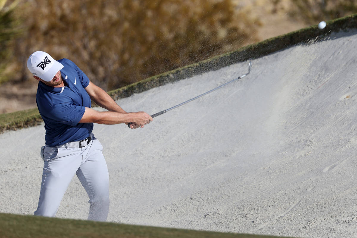 Wyndham Clark hits a bunker shot at the 15th hole during round three of the 2020 Shriners Hospi ...