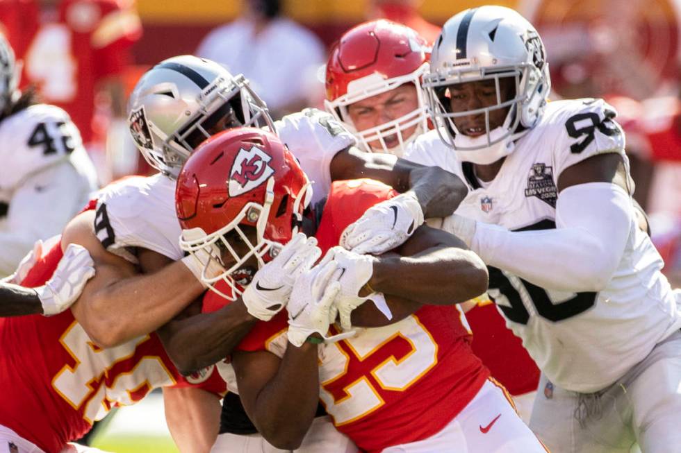 Kansas City Chiefs running back Clyde Edwards-Helaire (25) is stopped at the line of scrimmage ...
