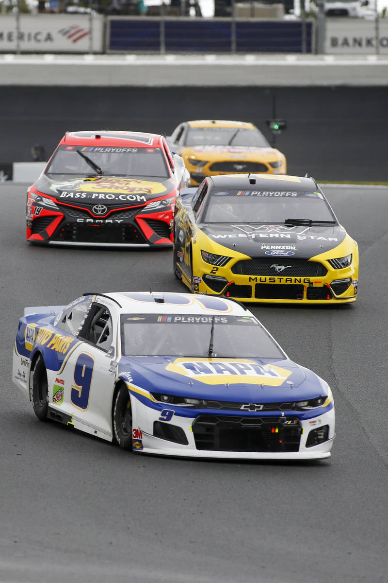 Chase Elliott (9) leads the way out of turn 7 in a NASCAR Cup Series auto race at Charlotte Mot ...