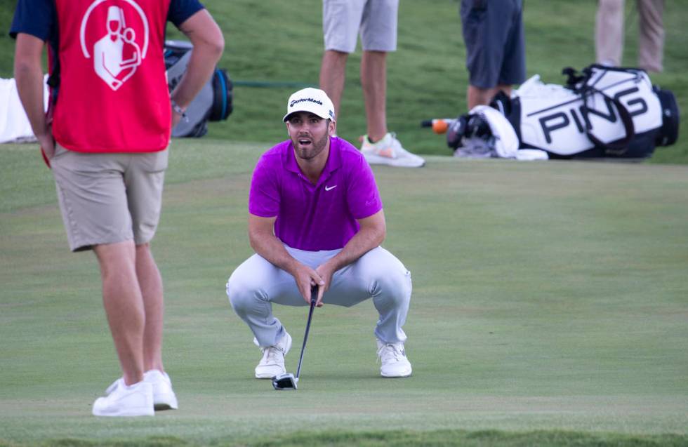 Matthew Wolff reacts after missing a putt on the 18th hole during a playoff in the final round ...