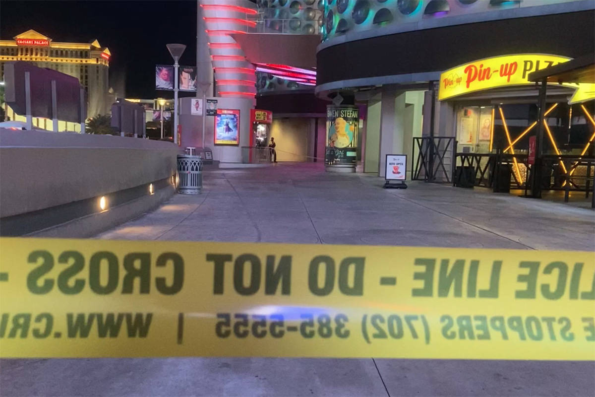 Police investigate a shooting at the Miracle Mile Shops on the Las Vegas Strip on Sunday, Oct. ...