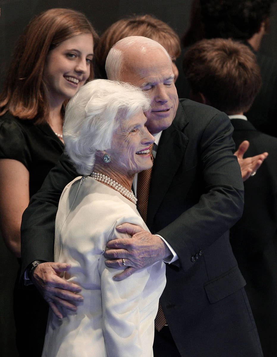 FILE - In this Sept. 4, 2008, file photo, Republican presidential nominee John McCain embraces ...
