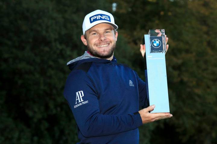 England's Tyrrell Hatton poses with the trophy after winning the PGA Championship at the Wentwo ...