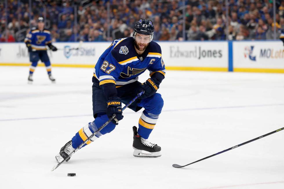 St. Louis Blues' Alex Pietrangelo handles the puck during the second period of an NHL hockey ga ...