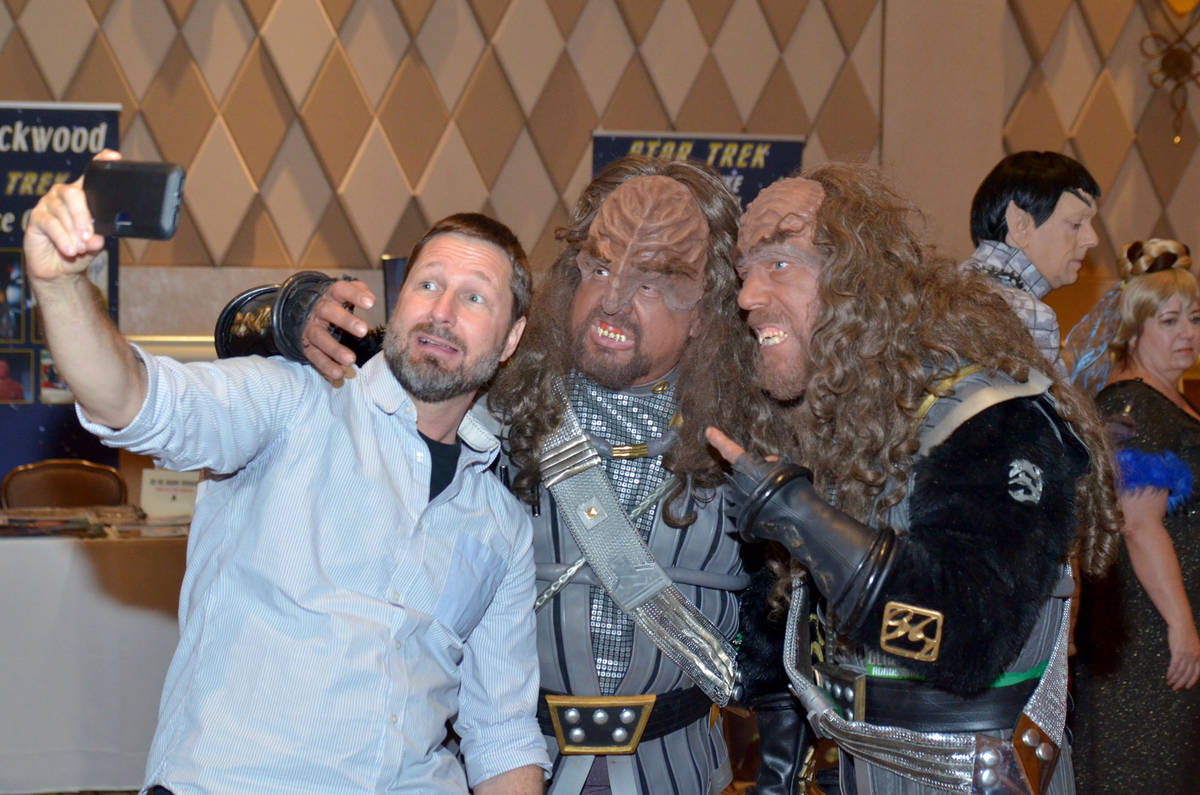 Marcus Nash, from left, takes a selfie with Nathan Whitley and Greg Reed, dressed as Klingons, ...