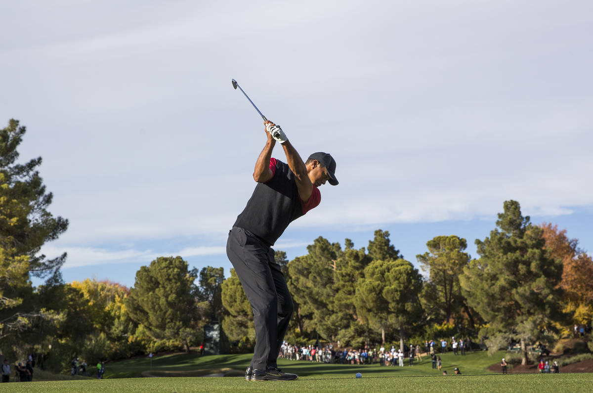 In this Nov. 23, 2018, file photo, Tiger Woods hits from the 9th fairway during The Match at Sh ...