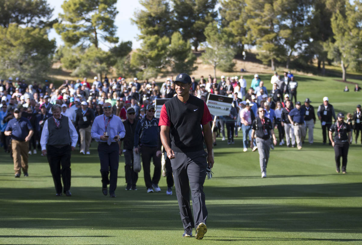 In this Nov. 23, 2018, file photo, Tiger Woods walks the fourth fairway during The Match at Sha ...