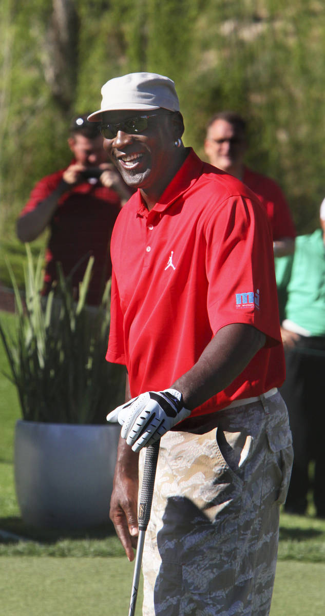 In this April 1, 2011, file photo, Michael Jordan arrives at the first tee of the Shadow Creek ...