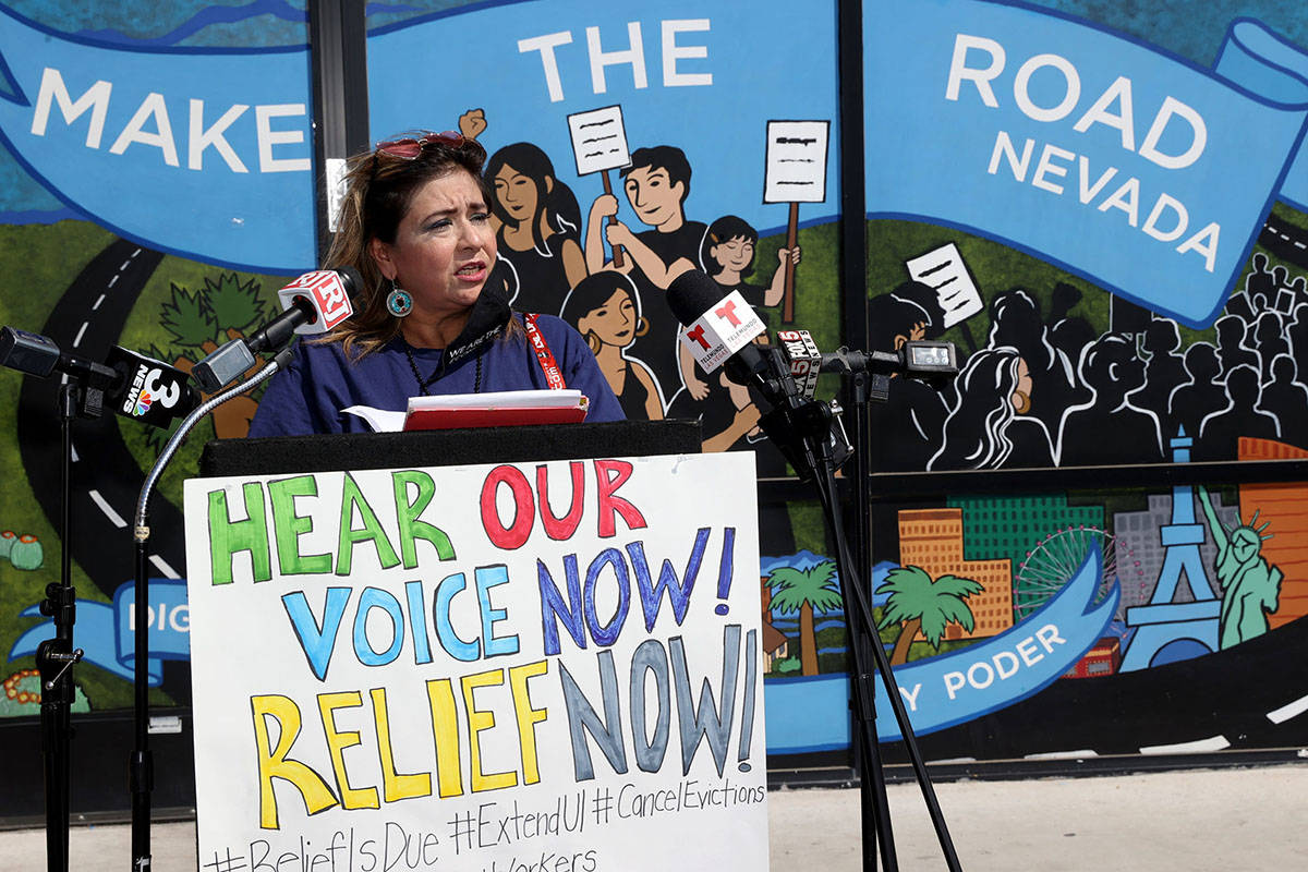 Maria Castillo, of Las Vegas, speaks at Make the Road Nevada offices before a car caravan in La ...