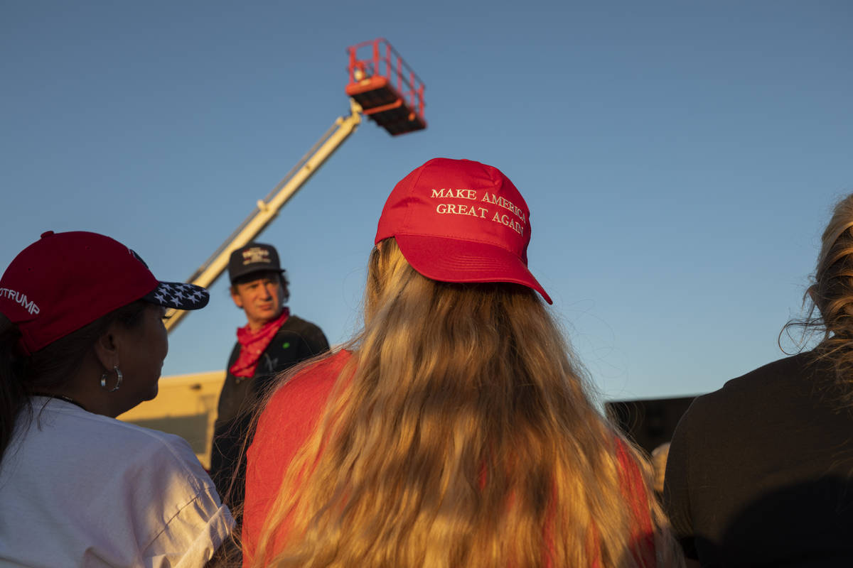 Attendees wait for Donald Trump Jr. to speak at a campaign event for President Trump on Wednesd ...