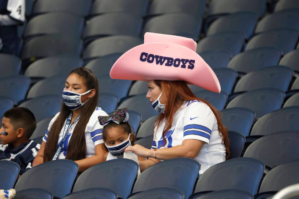 Fans wait for the start of a game between the Dallas Cowboys and the New York Giants in an NFL ...