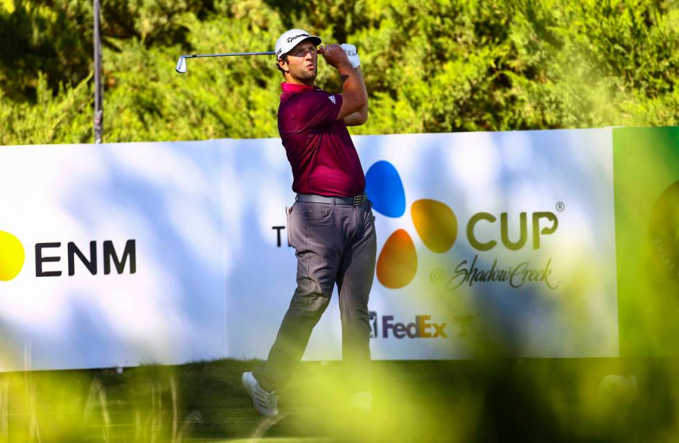 Jon Rahm watches his tee shot at the fifth hole during the first round of the CJ Cup at the Sha ...