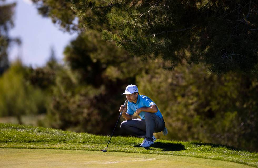 Xander Schauffele lines up a putt on the fifth green during the third round of the CJ Cup at th ...