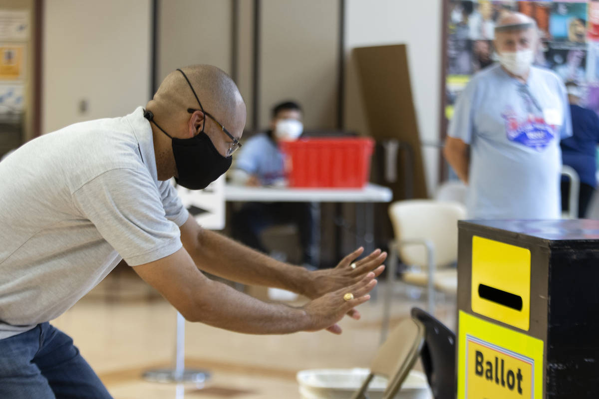 Nevada Attorney General Aaron Ford casts his ballot at Doolittle Community Center on Sunday, Oc ...