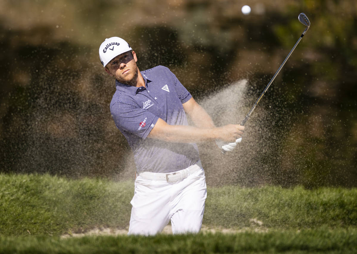 Talor Gooch hits out of the bunker onto the fourth green during the final round of the CJ Cup a ...