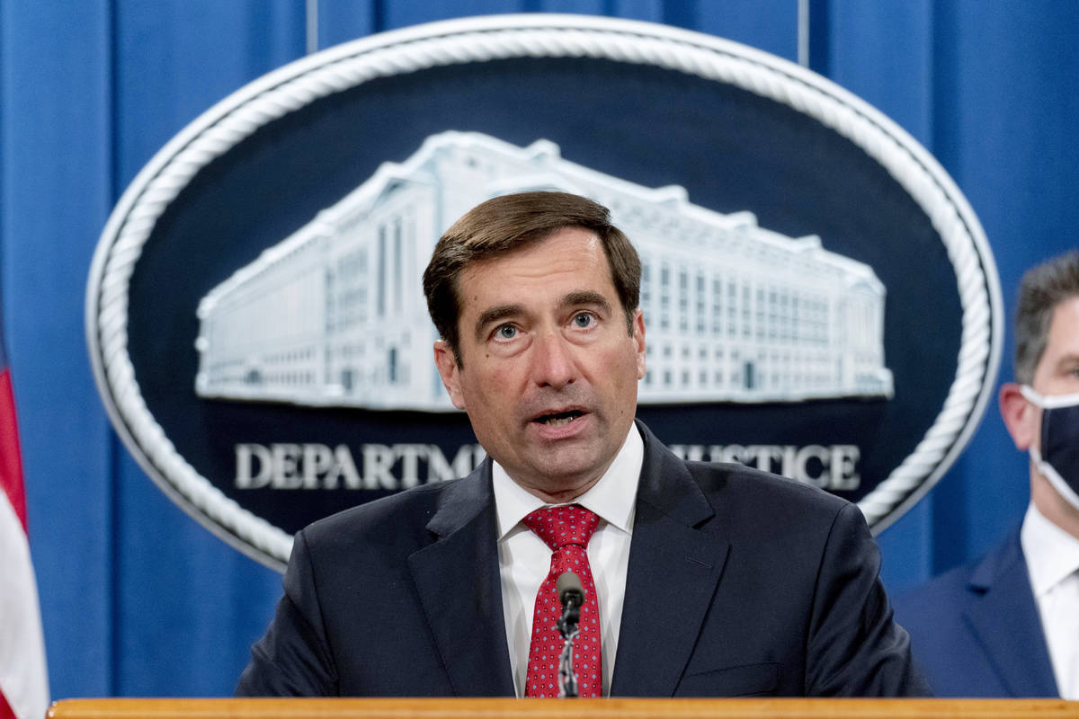 Assistant Attorney General for the National Security Division John Demers speaks at a news conf ...