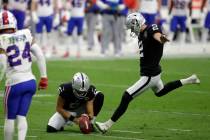 Las Vegas Raiders Daniel Carlson kicks a field goal during the second half of an NFL football g ...
