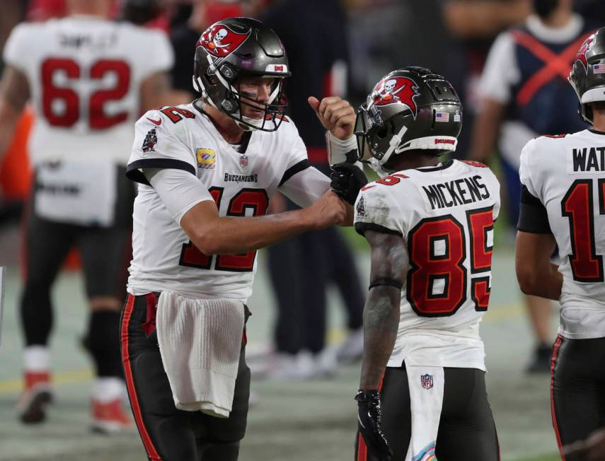 Tampa Bay Buccaneers quarterback Tom Brady (12) celebrates with wide receiver Jaydon Mickens (8 ...