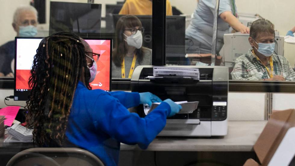 Clark County election workers count ballots at the Election Department warehouse, on Tuesday, O ...