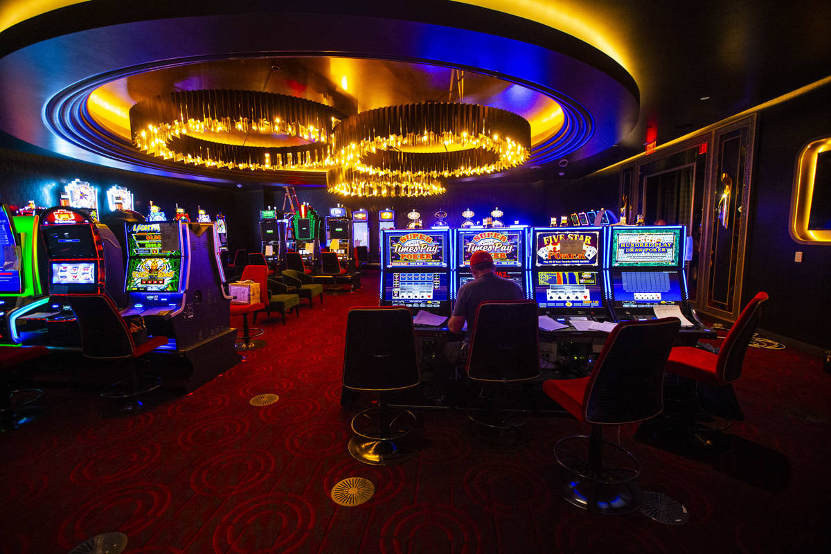 Slot machines are prepared inside the high limit gaming area during a tour of Circa, the first ...