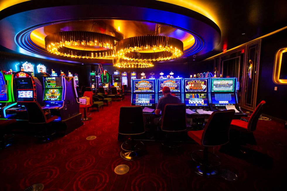 Slot machines are prepared inside the high limit gaming area during a tour of Circa, the first ...