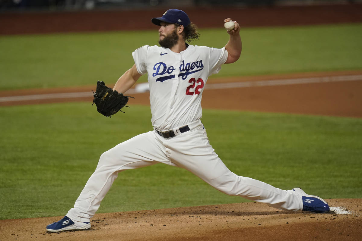 Los Angeles Dodgers starting pitcher Clayton Kershaw throws against the Tampa Bay Rays during t ...