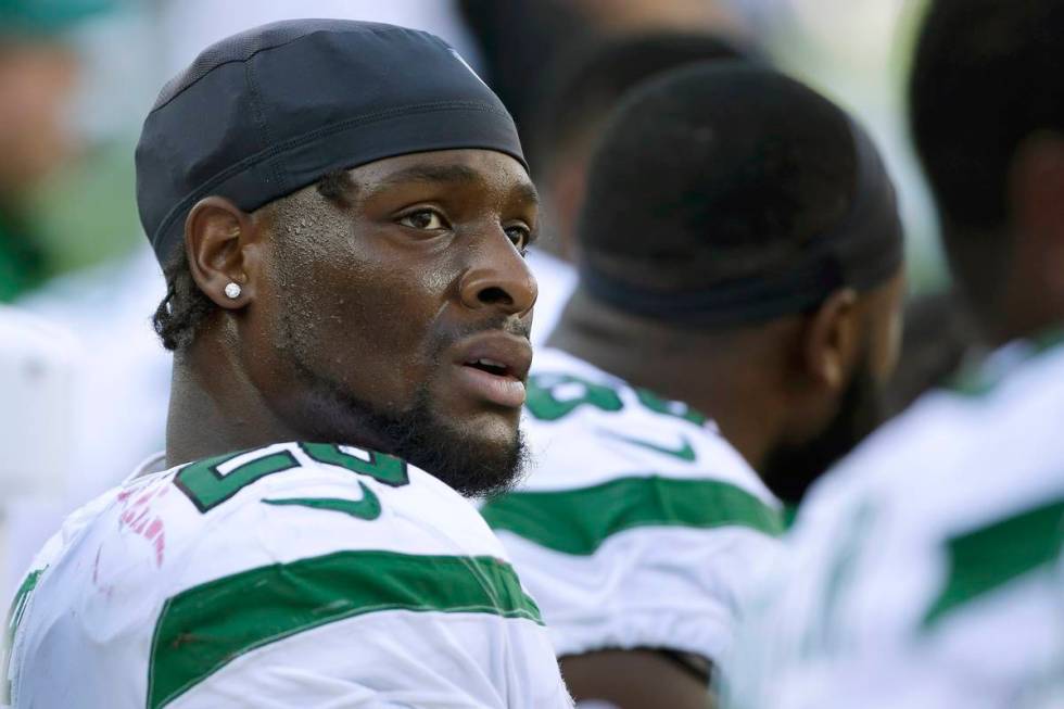 This Sept. 22, 2020, file photo shows New York Jets running back Le'Veon Bell watching from the ...