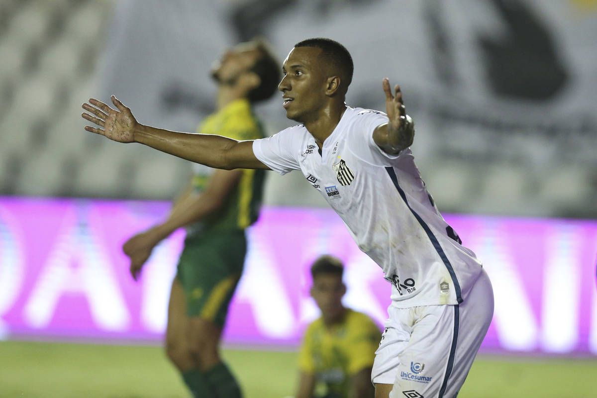 Lucas Braga of Brazil's Santos celebrates scoring his side's second goal against Argentina's De ...