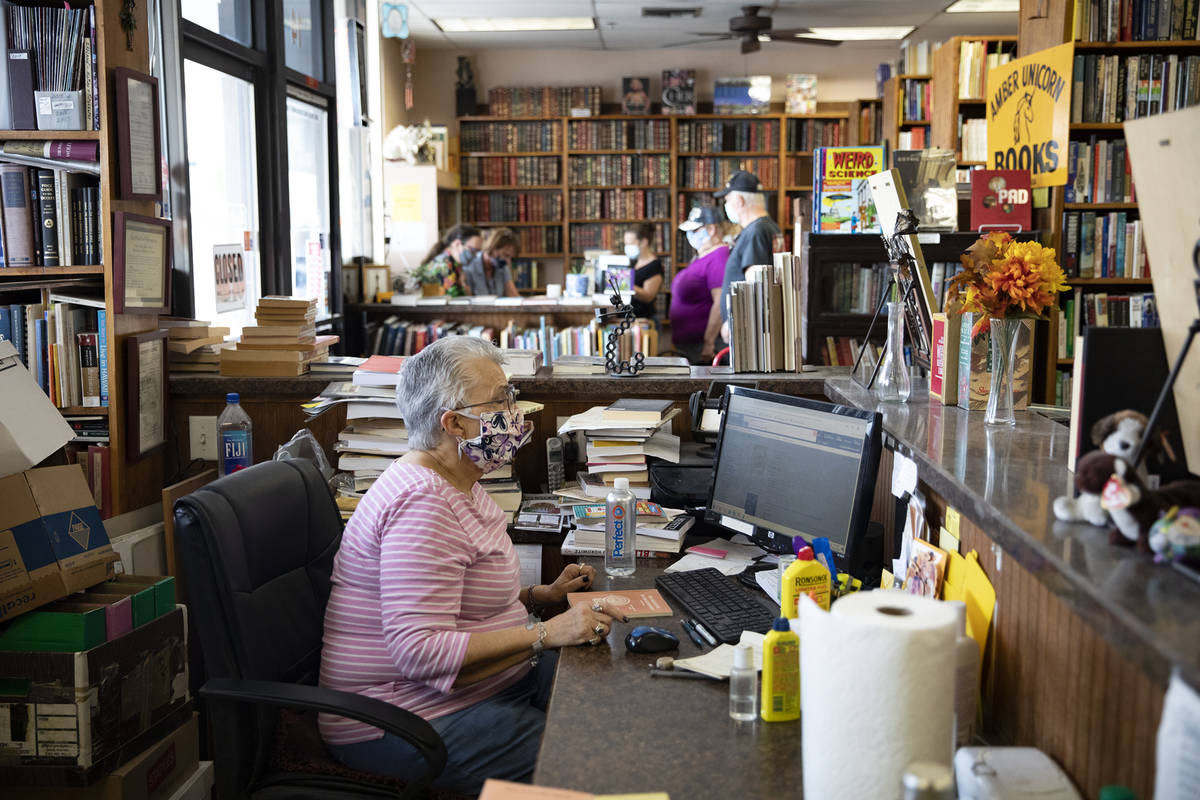 Owner Myrna Donato works at her computer at Amber Unicorn Books in Las Vegas, Wednesday, Oct. 2 ...