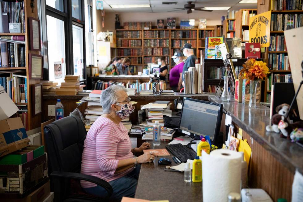 Owner Myrna Donato works at her computer at Amber Unicorn Books in Las Vegas, Wednesday, Oct. 2 ...