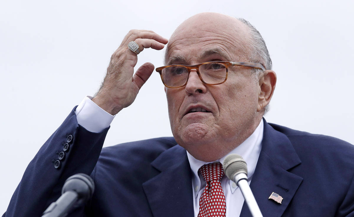 FILE - In this Aug. 1, 2018 file photo, Rudy Giuliani, an attorney for President Donald Trump, ...