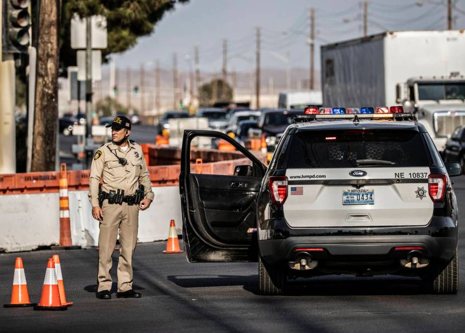 The LVMPD investigate a barricade situation involving a man not allowing a female and child to ...