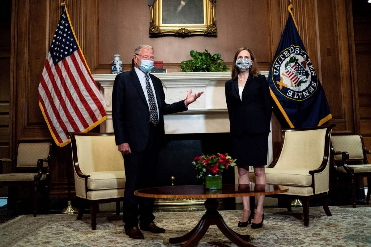 Supreme Court nominee Amy Coney Barrett meets with Sen. Jim Inhofe, R-Okla., Wednesday, Oct. 21 ...