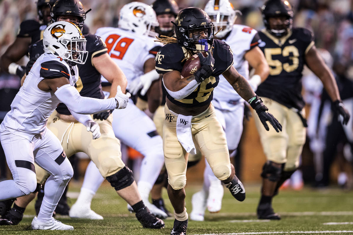 Wake Forest running back Christian Beal-Smith (26) carries against Campbell during an NCAA coll ...