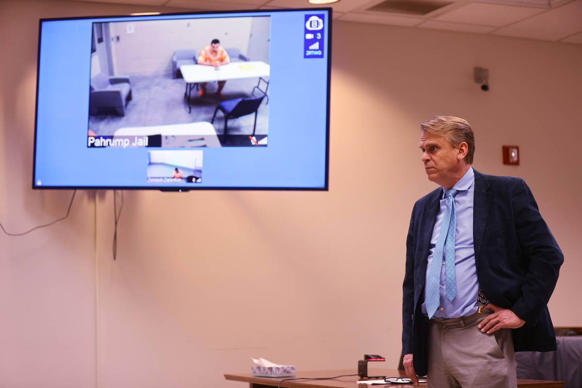 Defense attorney Brent Percival argues during sentencing for Dakota Saldivar, on screen at left ...