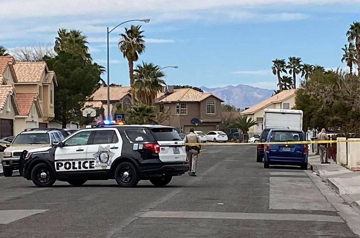 Police investigate a fatal crash on Fairlight Drive near Sloan Lane in east Las Vegas on March ...