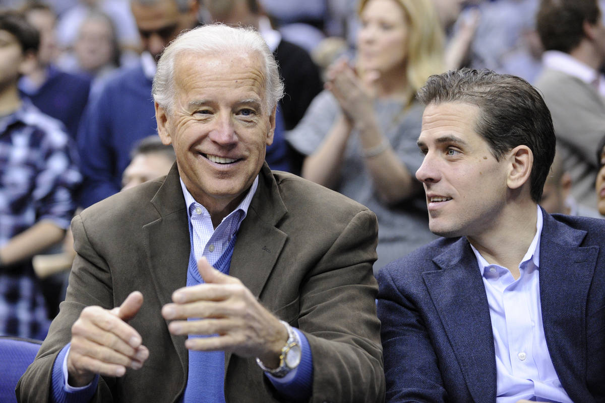 FILE - In this Jan. 30, 2010, file photo, Vice President Joe Biden, left, with his son Hunter, ...