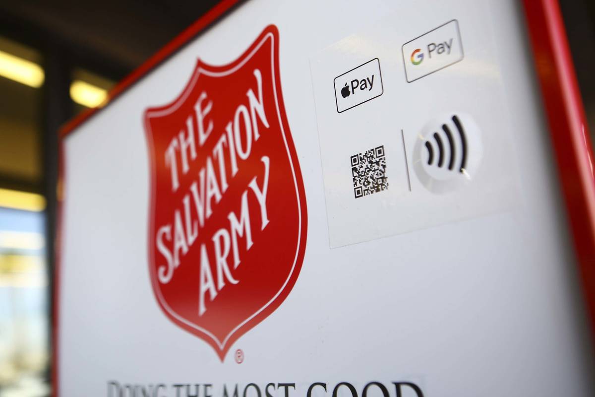 Signage for The Salvation Army featuring a QR code that allows users to donate with their mobil ...