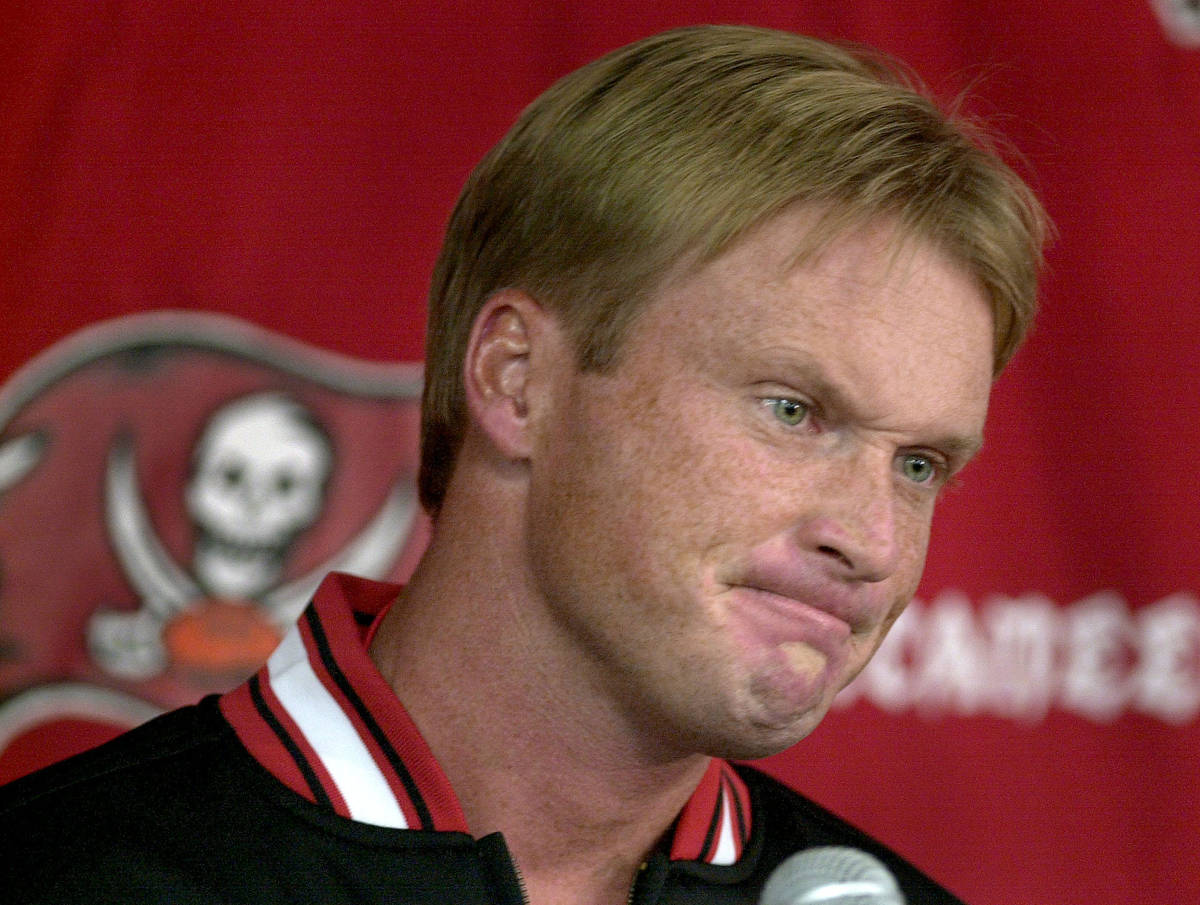 Tampa Bay Buccaneers head coach Jon Gruden frowns during his morning news conference Monday, N ...