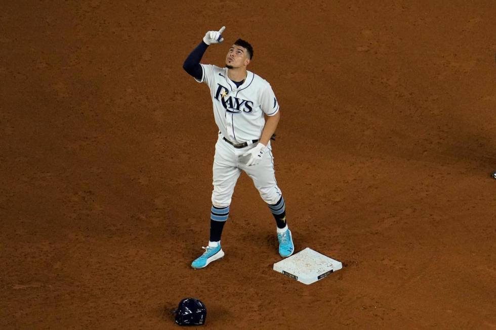 Tampa Bay Rays' Willy Adames celebrates a RBI-double against the Los Angeles Dodgers during the ...