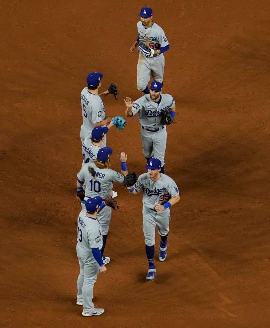 Los Angeles Dodgers' Austin Barnes celebrates a home run during the sixth inning in Game 3 of t ...