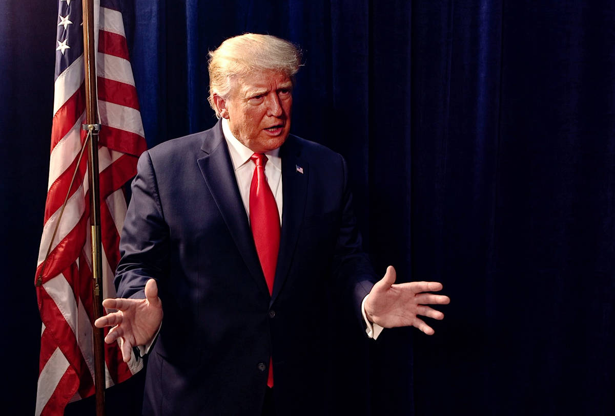 President Donald Trump is interviewed by the Las Vegas Review-Journal outside a campaign rally ...