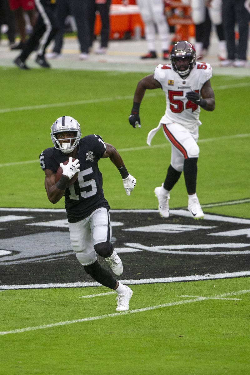 Las Vegas Raiders wide receiver Nelson Agholor (15) runs after making a catch as Tampa Bay Bucc ...